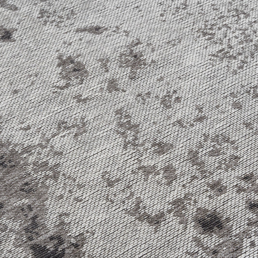 Grauer Teppich mit Jacquardwebmuster