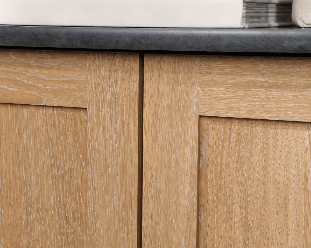 Three shelf bookcase in Oak finish with slate coloured accent