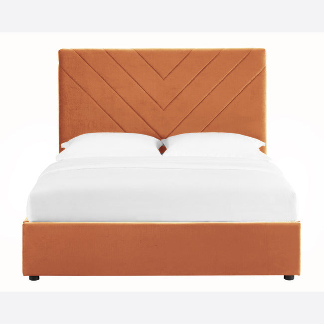 Beautiful Burned Orange Kingsize Bed upholstered in velvet with geometric headboard