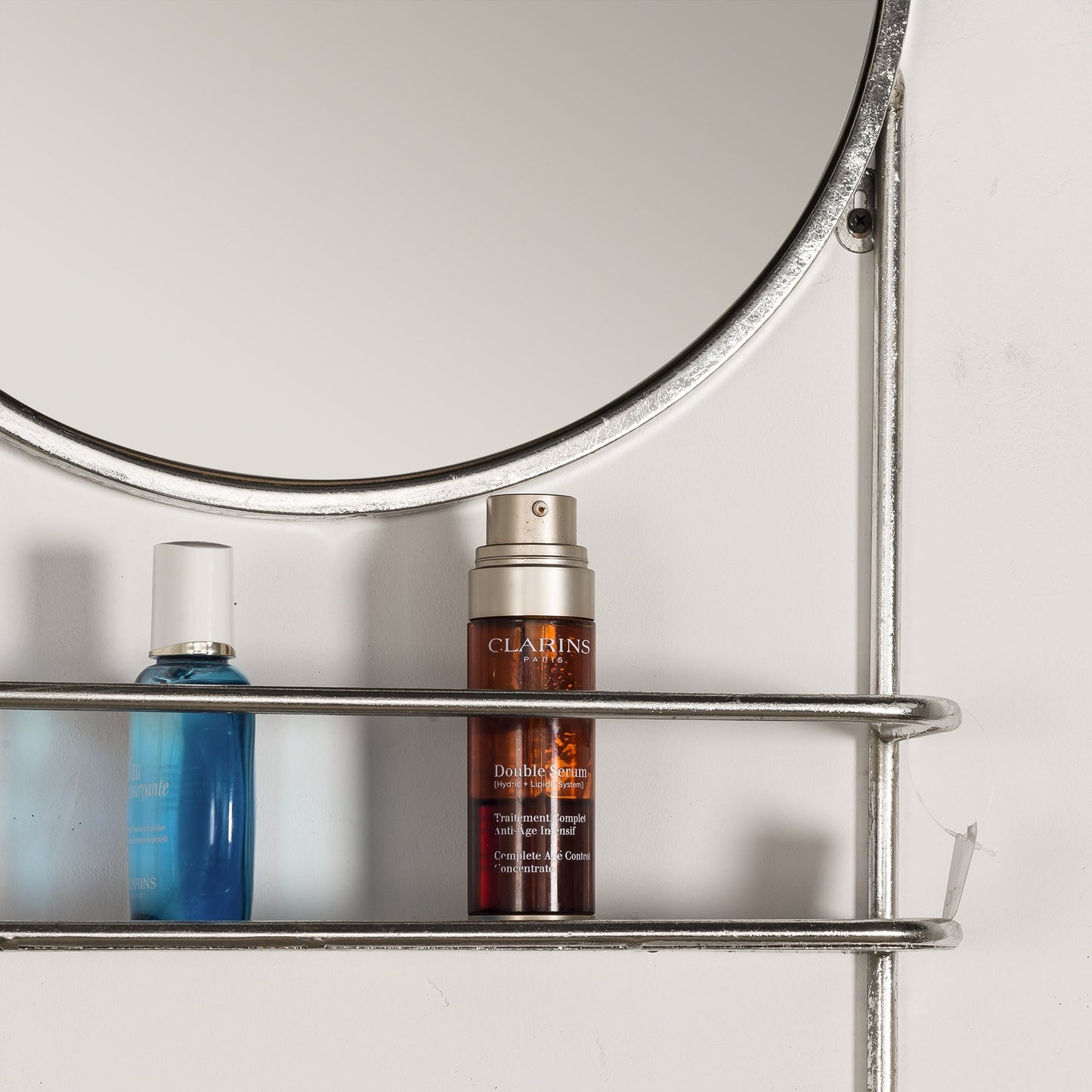 Wandspiegel aus Metall mit Ablage - Blattsilber vergoldet