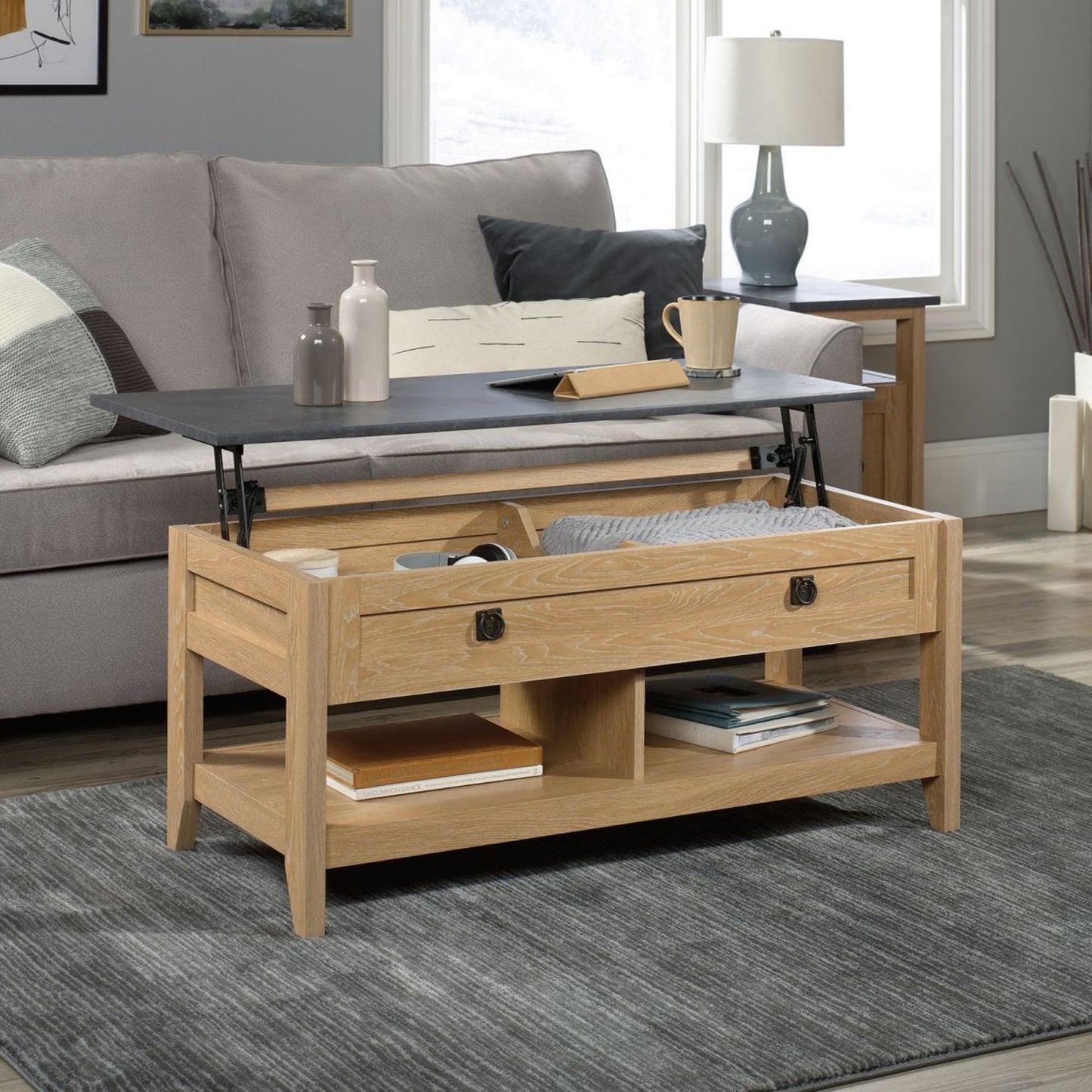 Lift up coffee / work table in Oak finish with slate finish accent