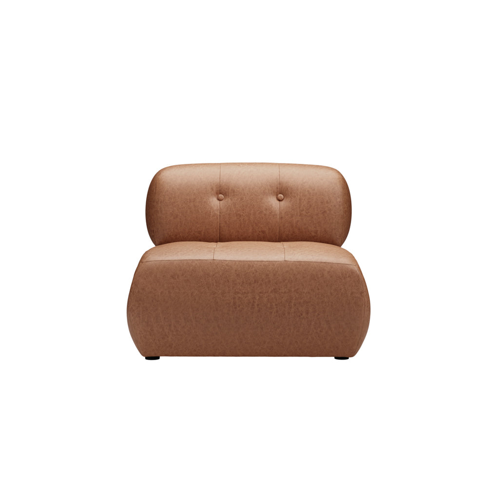 Tan leather tufted armchair