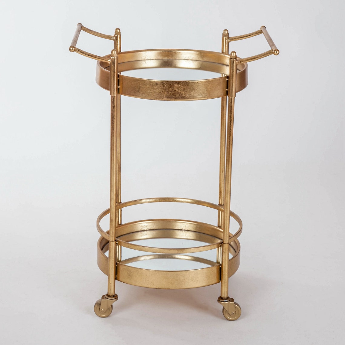 Glamorous round gold leaf, drinks/ serving trolley