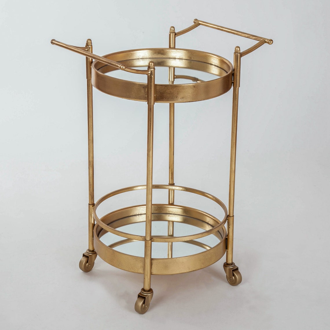 Glamorous round gold leaf, drinks/ serving trolley