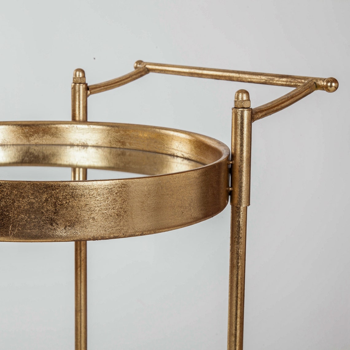 Glamorous round gold leaf, drinks/ serving trolley