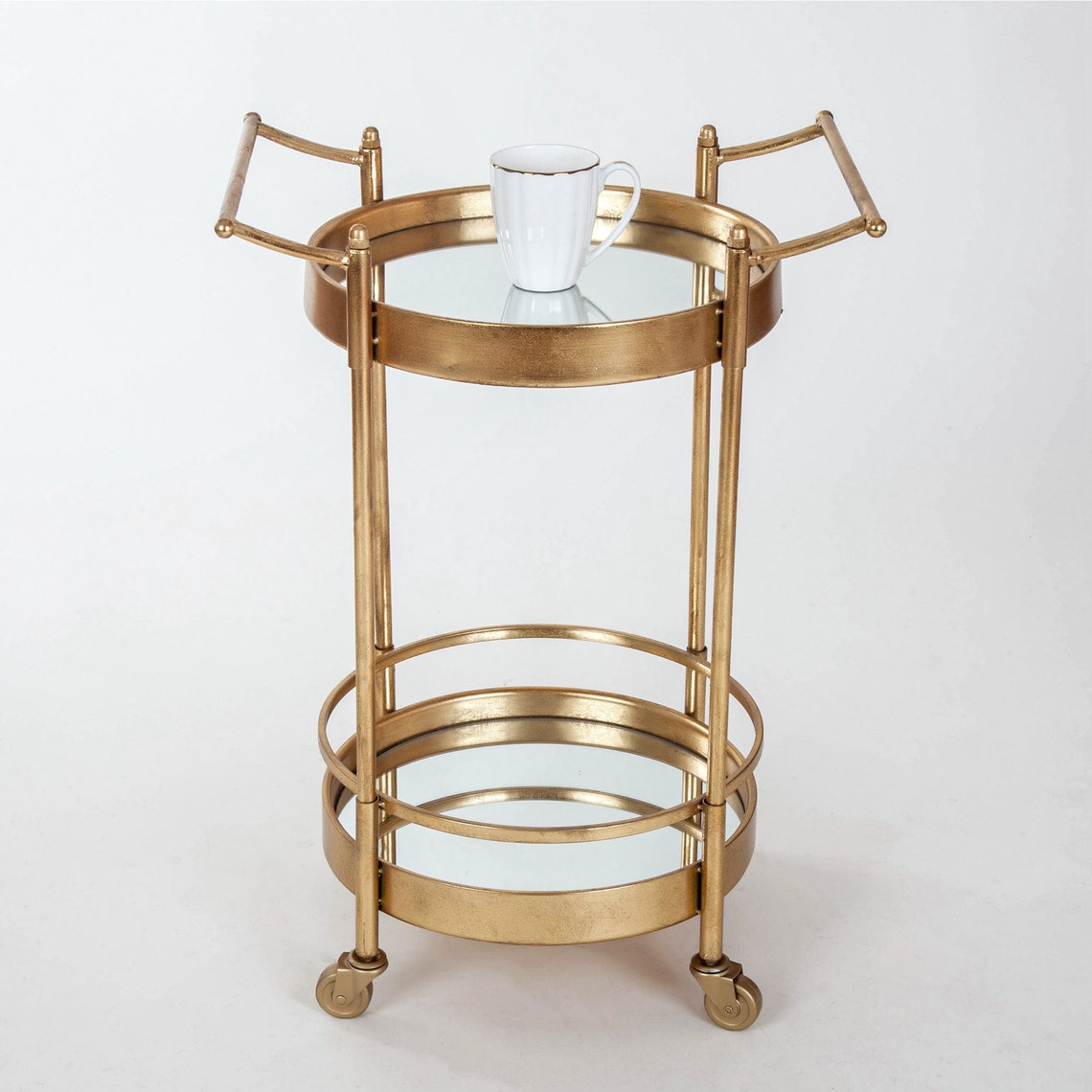 Glamorous round gold leaf, drinks/ serving trolley